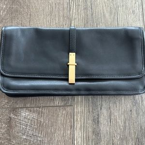 Black clutch with gold detailing